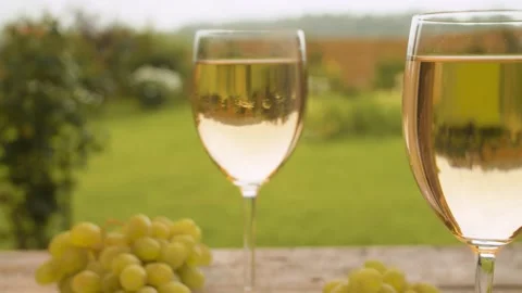 Two glasses of wine and bunch of grape Stock Footage 137059466