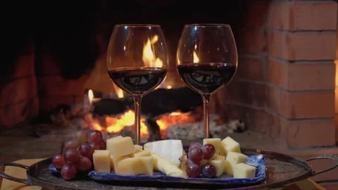 Two glasses of wine on fire background, dolly shot Stock Footage 166241269