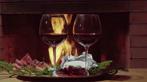 Two glasses of wine with flame on background Stock Footage 166062540