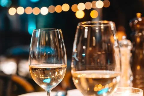 Two glasses of wine on the table Stock Photos