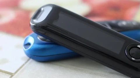 Two Glucose Meters Lying on a Table Stock Footage 67472169