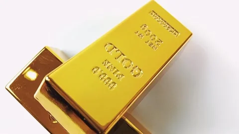 Two gold bars rotating on a white background Stock Footage 329081016