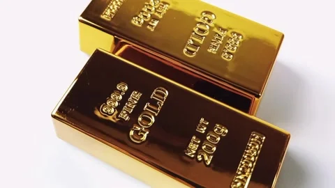 Two gold bars rotating on a white background. Precious metals Stock Footage 329081054