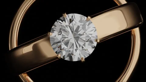 Two gold diamond rings rotating on black background from 3D animation design. 3d Stock Footage 272256265