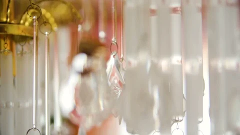 Two gold wedding rings shining with light. Macro Transfusion of light on rings Stock Footage 95640168