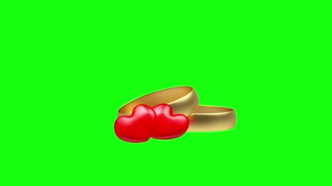Two golden wedding rings with red hearts on green screen, 3D rendering. Видео 337062060