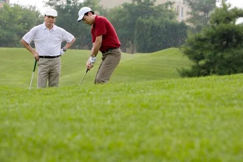 Two Golfers on the Course Stock Photos