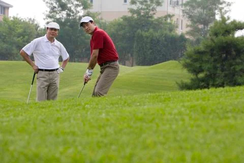 Two Golfers on the Course Stock Photos