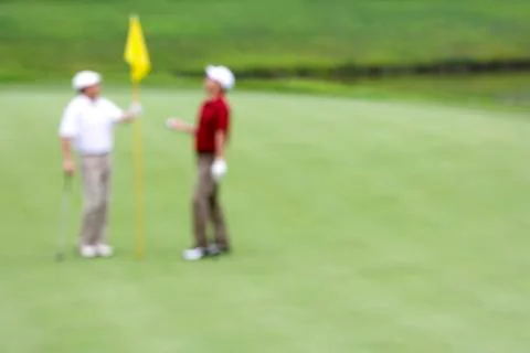 Two Golfers on the Green Stock Photos