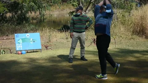 Two golfers play Stock Footage 146468273
