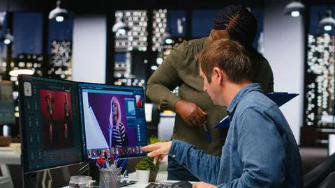 Two graphic editors using AI and software for color retouching Stock Photos