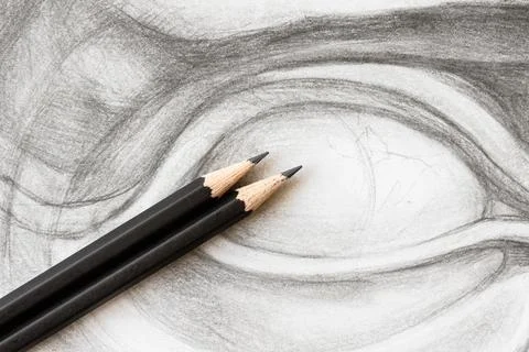 Two graphite pencils on drawing of David's eye Stockfoto's