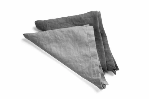 Two gray shade linen napkins made of softened fabric for serving table setup Stock Photos