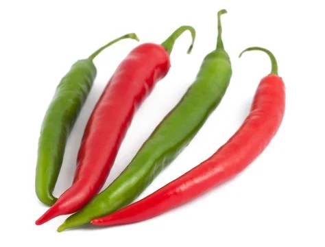 Two green and two red chili peppers on white Stock Photos
