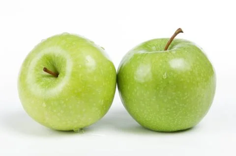 Two green apples Stock Photos