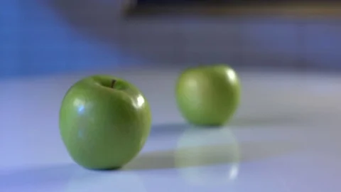 Two green apples on the table 動画素材 75697319