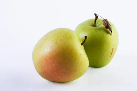Two green apples on a white background. Stock-Fotos
