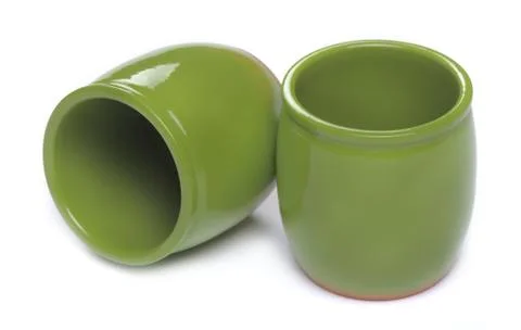 Two green ceramic jars isolated on white background Stock Photos