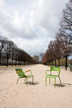 Two  Green Chairs on a path In Paris, France 스톡 사진