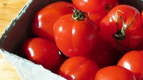Two green containers of fresh red strawberry tomatoes 1250 Stock Footage 43292145