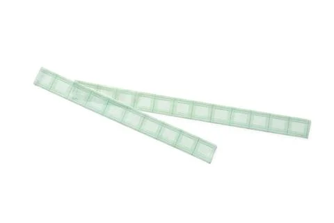 Two green fabric strips with square patterns Photos