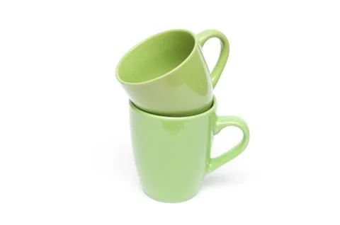 Two green mugs empty blank, isolated on white background 写真素材