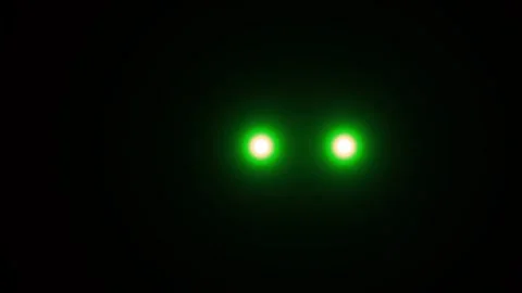 Two Green Orbs Light One Static In The Middle The Other Move Horizontally Stock Footage 244330924