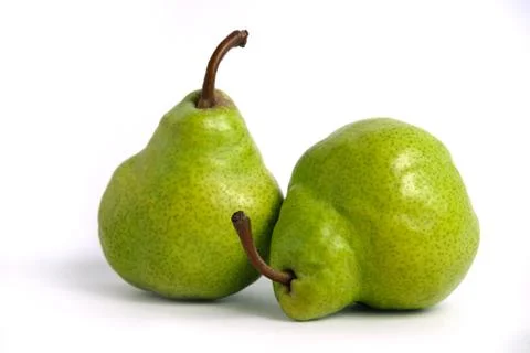 Two green Packham pears fruit isolated on white background Stock Photos