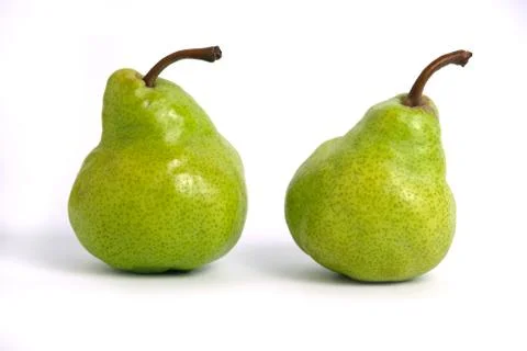 Two green Packham pears fruit isolated on white background Foto stock
