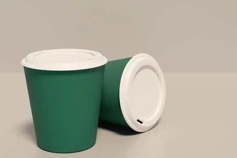 Two green paper cups sit on a table. Illustrazione stock