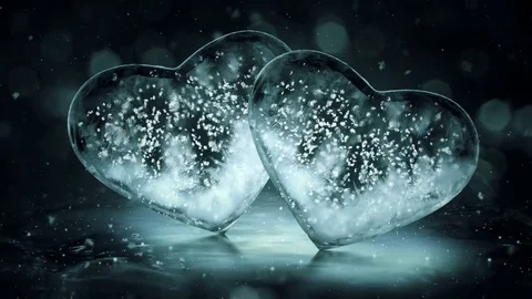 Two Grey Noir Ice Glass Hearts with snowflakes inside motion background Loop 4k Stock Footage 82213858
