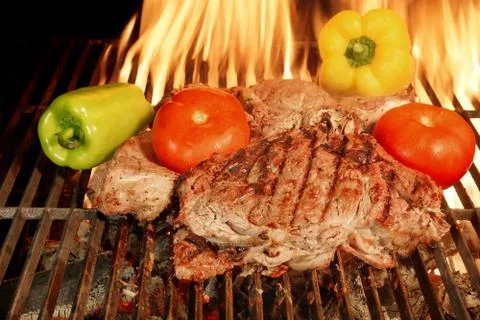 Two grilled beef steaks with vegetables  Stock Photos