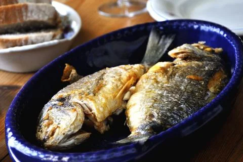 Two grilled fish Stock Photos