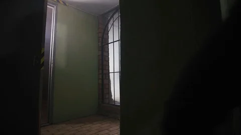 Two guards get attacked by two inmates from behind the bars, 4k Stock Footage 104048062