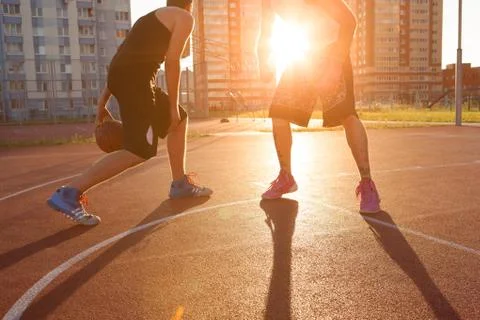 Two guy play basketball at district sports ground Stock-Fotos