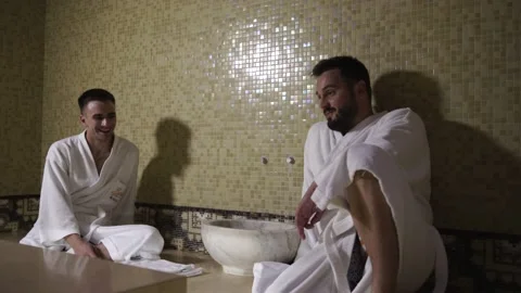 Two guys are talking in a hamam Stock Footage 141797706