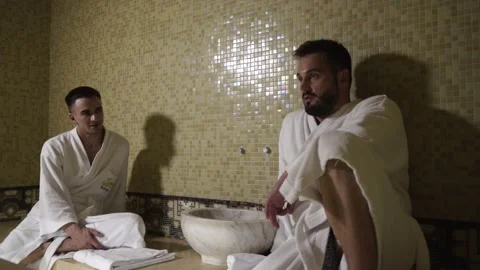 Two guys are talking in a hamam Stock Footage 141797746