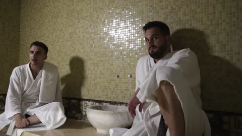Two guys are talking in a hamam Stock Footage 141797757