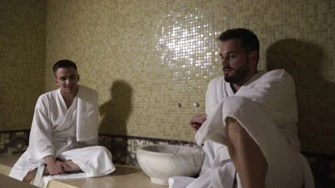 Two guys are talking in a hamam Stock Footage 141797922