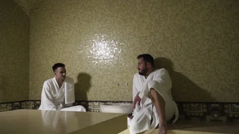 Two guys are talking in a hamam Stock Footage 141797995