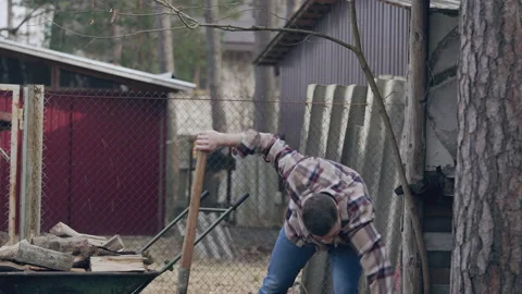 Two guys are working in the garden Stock Footage 234538186