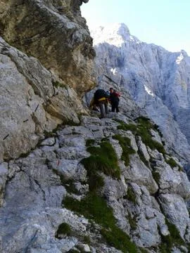 Two guys climbing on mountain Stock Photos
