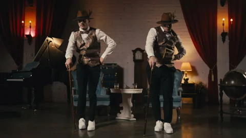 Two guys in dandy style outfit synchroni... | Stock Video | Pond5