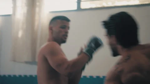 Two Guys fight in dojo Stock Footage 275426891