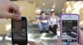 two guys goofing around doing funny poses - cell phones - photo HD Footage