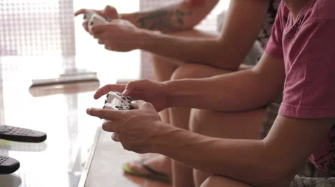 Two guys playing game Stock Footage 50797160