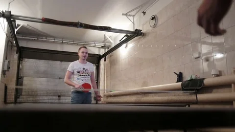 Two guys playing ping pong Stock Footage 81830736