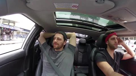 Two Guys Relax in the Car Stock Footage 43077554