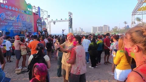The two guys take a selfie at the Holi festival in Pattaya. People have color Stock Footage 334018187