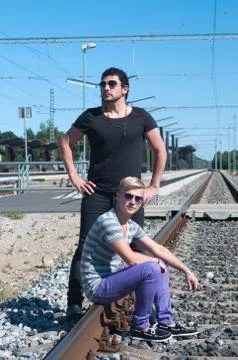Two guys on train tracks Stock Photos